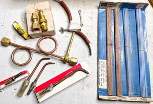 lot 741 image: Box of Welding Equipment - Gas Filler Lines, Welding Tips, Adaptors, and More