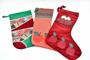lot 808 image: Nine Assorted Christmas Stockings, Variety of Shapes and Sizes