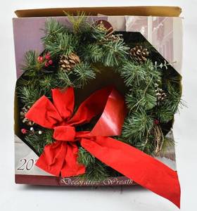 lot 804 image: Two Fake Pine Wreaths and Two Additional Decorative Pine Pieces