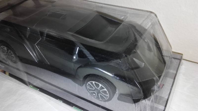 lot 706 image: Friction Super Racer Toy Sports Car