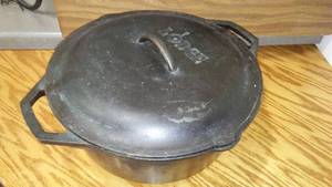 lot 525 image: LODGE Cast Iron Pot And Cover.