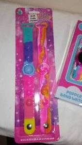 lot 824 image: LED Digital Childrens Watch with Pop It Interactive Band and Bracelets (2)