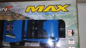 lot 870 image: Battery Operated Cross-Country Car with Steering Wheel Remote Control