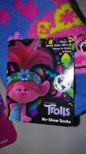 lot 911 image: Troll Socks, Pop-It Bracelets, Nail Art Set.