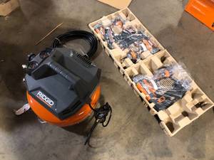 RIDGID 6 Gal. Portable Electric Pancake Air Compressor w 18GA Brad Nailer, 16GA Straight Finish Nailer, & 18GA Finish Stapler   Customer Returns See Pictures
