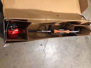 ECHO 21.2 cc Gas 2-Stroke Curved Shaft String Trimmer with Rapid-Loader Trimmer Head    Customer Returns See Pictures