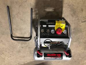 Husky 4.5 Gal. Portable Electric-Powered Silent Air Compressor Customer Returns See Pictures