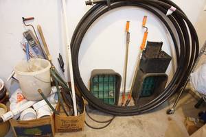 lot 86 image: Garage Rake, Knife Pruner Set, Tubing Etc...