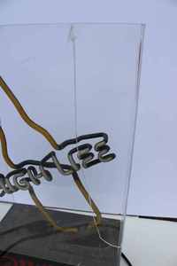 lot 13 image: Miller High Life neon sign. Not working, plastic cover has a crack, 10x18x5