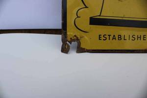 lot 14 image: Winona Monument sign. Embossed tin tacker, some condition issues, 10x14