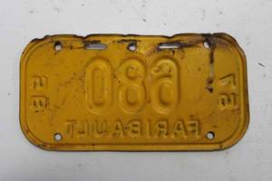 lot 36 image: 1957 & 1958 Faribault license plate, 3x6