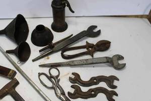 lot 43 image: Oil Cans, Assorted Wrenches, Vintage Cardboard Dairy Thermometer Box, and More