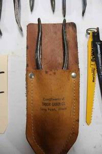 lot 49 image: Lot of misc. pliers, Pinchers, and a leather advertising plier pouch from Tabor Grain Co. Long Point, IL