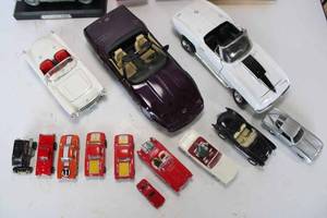 lot 55 image: Chevrolet Corvette Toys, Christmas Ornaments, Calendar, and Several Other Toy Cars