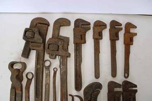 lot 57 image: Two Pipe Wrenches, Six Vintage Adjustable Wrenches, Pinchers, Assorted Other Wrenches, and More