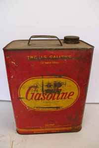 lot 58 image: Gas can, Vintage Work Lamp, New Idea Farm Equipment Advertising Crow Bar, Simoniz Tin