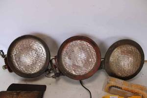 lot 65 image: Laser Level, Three Tractor HeadlampsWork Lights, Mobil Pegasus, and Wood Bearing Blocks