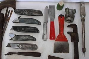 lot 67 image: Vintage Tools Box Cutters, Adjustable wrenches, Art Deco Plastic Tape Measure, Wetstone from Kaminsky Feed Store