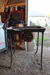 lot 70 image: Large blacksmith forge, needs handle and belt, may need some freeing up, no cracks or breaks, 39 tall, pot measures 2x3