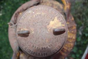 lot 76 image: Large Shell 10 gal. oil can, brass tag says Shell, cap says Davis Welding and Manufacturing Co.