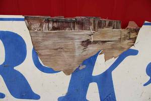 lot 81 image: Marks Barber Shop sign, single sided wood, lots of damage, 7x3
