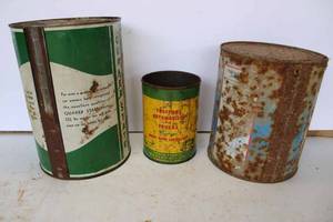 lot 135 image: Lot of 3 oil cans, Quaker State 5 qt. measuring 9.5 tall, Motor King antifreeze measuring 8 tall, Paraline oil 1 qt. Can