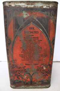 lot 136 image: Standard Ruddy Harvester oil can, 1 gal. measures 9.5 tall, missing the spout and handle, awesome farm graphics