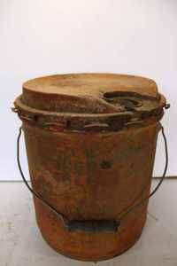 lot 140 image: 3 can lot, Midland Coop grease can 14.25 tall, 2 gal. gasoline can, Skelly tagolene grease bucket 7.5 tall