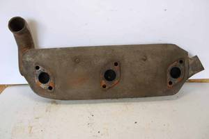 lot 148 image: Autolite heater manifold accessory for a flat head Ford V8