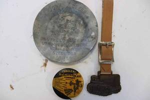 lot 154 image: Lot of vintage small advertising pieces, JD tip plate, Challenge windmill pin, American Legion button, Oliver crawler watch fob