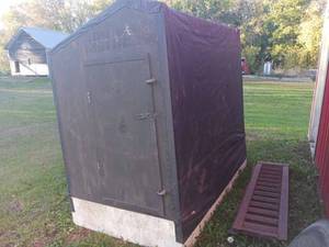 lot 187 image: Collapsible spear fishing house 4x6.5, some holes in canvas, comes with small wood burning stove