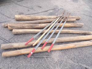 lot 140 image: Wood and Metal Fence Post
