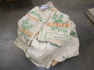 lot 36 image: 12 Canvas Alfalfa Seed Bags  With Date Tags