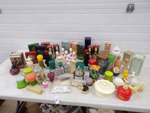 lot 129 image: 50 Assorted Vintage AVON Products