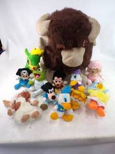 lot 114 image: Lot of Stuffed Animals  Large Bison Mickey Mouse Gremlin and More
