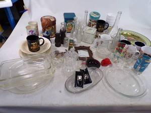 lot 89 image: Lot of Pyrex Pie plate, Glass Pyrex Bread Pan, Wooden Salt and Pepper mill with much more