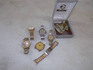 lot 87 image: Lot of Vintage Watches with a Torn $1 Bill