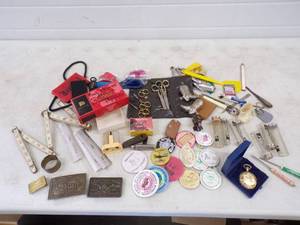 lot 151 image: Misc. Lot of Smalls Measuring tapes Buckles Pinbacks and More