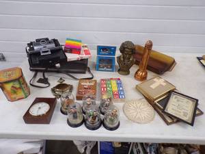 lot 195 image: Fantastic Lot of Polaroid Camera with Unopened Film Solid Copper Flashlight Mozart Bust and many other Unique Items