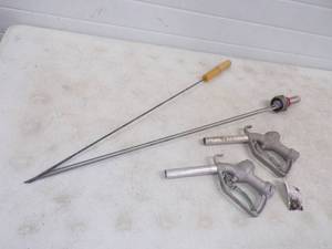 lot 222 image: 2 EBW Gas pump Nozzles made in the USA and a Therma-gage