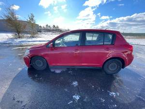 lot 21B image: 2010 Nissan Versa 1.8 S