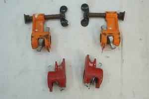 lot 128 image: Pipe clamp ends
