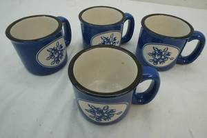 lot 194 image: 4 Stoneware mugs Blueberry Design Capeshore Brand