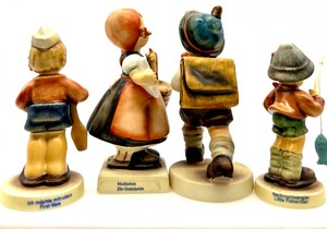 lot 132 image: GOEBEL M.I. HUMMEL First Mate, Meditation, Little Fisherman, School Boy Club Figurines