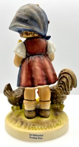lot 143 image: GOEBEL M.I. HUMMEL Feeding Time # 199 Figurine