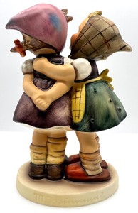 lot 145 image: GOEBEL M.I. HUMMEL Telling Her Secret #196 Figurine