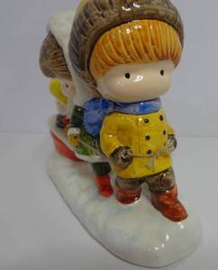lot 70 image: Vintage 1972 Joan Walsh Aglund Winter Figurine Kids Sledding