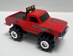 lot 5 image: 1980s Schaper Stomper4X4 Gen.1 Red Toyota SR5 Pickup  (Works Great) (VERY CLEAN)