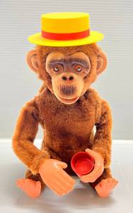 lot 139 image: 1960s Alps Battery Operated Lucky Seven Dice Throwing Monkey (WORKS) Missing Dice