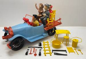 lot 142 image: Vintage 1963 Ideal Filmways Beverly Hillbillies Large Plastic Wind UP Jalopy With Figures And More (Works) Has Some Repairs On Front Bumper & Windshield Frame